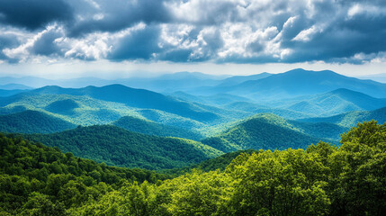 Fototapeta premium Vast mountain ranges with lush greenery and dramatic clouds in the background. 
