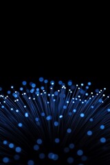 Abstract representation of blue light fibers on a dark background.