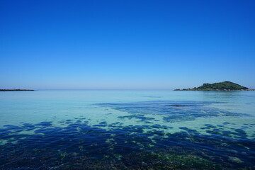 clear water and far island
