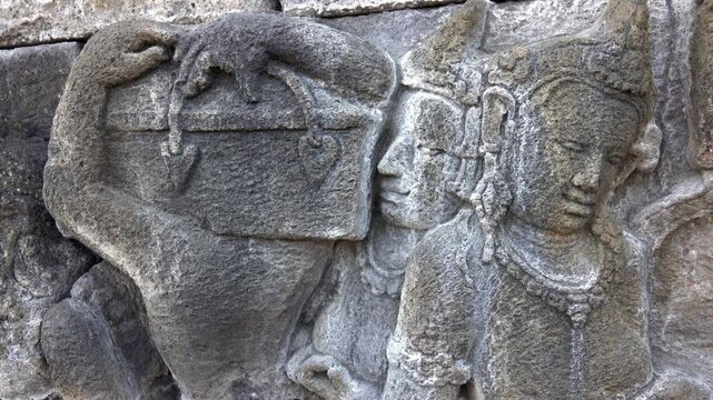 Buddhist parables are depicted in the ancient carving of Borobudur Temple in Indonesia.