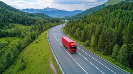 Fototapeta premium Red Truck Driving Through Lush Green Mountains Under a Cloudy Sky Along a Winding Road