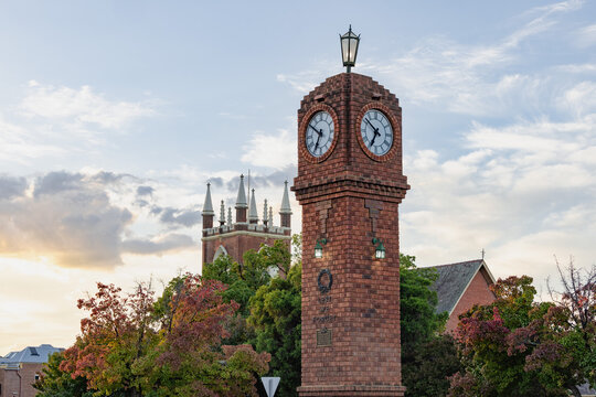 The iconic clock tower in the middle of roundabout at Mudgee with Church in background
