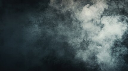 Abstract image of white smoke on dark background.