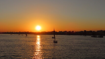 Naklejka premium sunset on the river