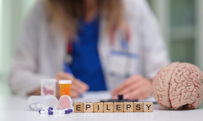 A detailed medical illustration centered on epilepsy, featuring essential medication, alongside brain anatomy