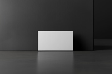 Fototapeta premium A clean and professional mockup of a single business card placed in the center. Ideal for showcasing personal or corporate branding designs, perfect for business cards for professionals