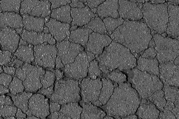 Cracked asphalt texture. Top view. Asphalt. Road background