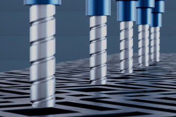 A row of sharp metal tools with blue tips