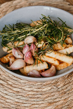Fresh hot chips with herbs and garlic