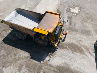 Aerial view of a dump truck in a quarry.