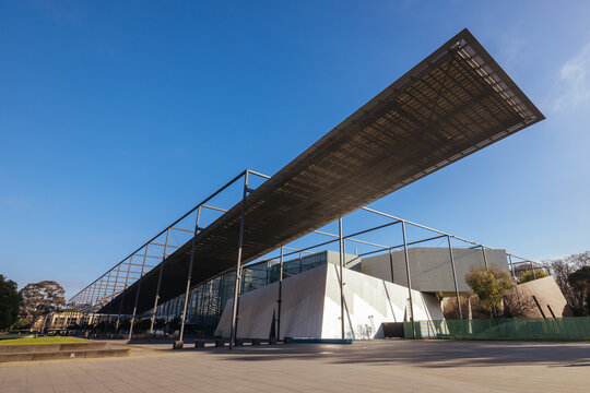 MELBOURNE, AUSTRALIA - AUGUST 1, 2024: Melbourne Museum and Carlton Gardens on a clear sunny day