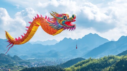 Vibrant dragon kite soaring over scenic mountain landscape under clear sky