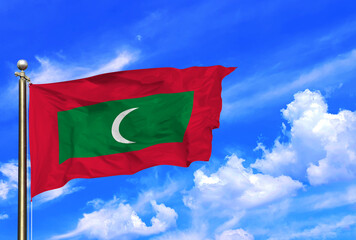 Maldives National Flag Waving Under Bright Blue Skies