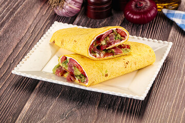 Burrito with tuna and vegetables wrap