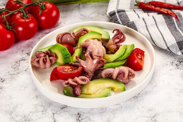 Salad with baby octopus and avocado