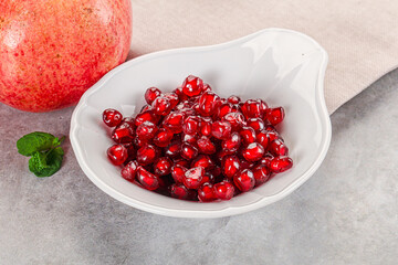 Ripe sweet red pomegranate seeds