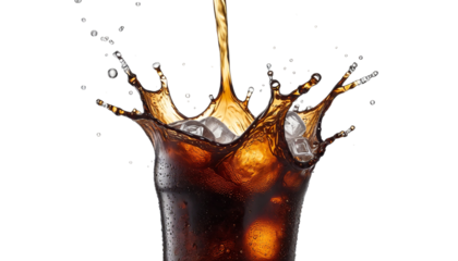 PNG of A refreshing splash of cola with ice cubes on transparent background.