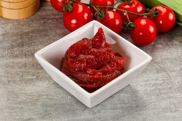 Red tomato paste in the bowl