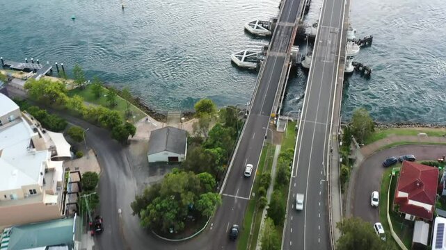 Swansea shopping village to Spit bridge &ndash; aerial above flying over Pacific highway
