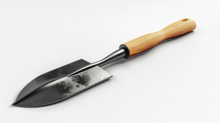 Fototapeta premium Close up view of a gardening tool with a wooden handle and a sharp metal blade The tool is typically used for digging cultivating and preparing the soil for planting in a garden yard