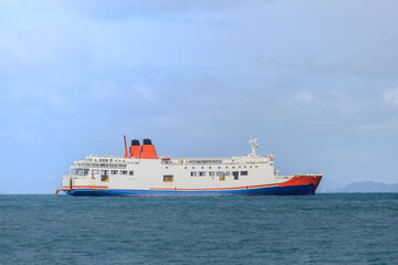 Fototapeta premium Ferry Ride on a Bright Sunny Day. Passenger boat under clear blue sky