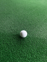 golf ball on green grass
