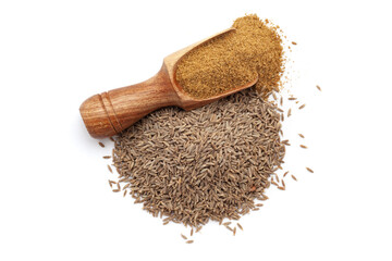 A wooden scoop filled with organic Cumin Seeds (Cuminum cyminum) or jeera powder, placed beside a heap of whole Cumin Seeds, isolated on a white background.