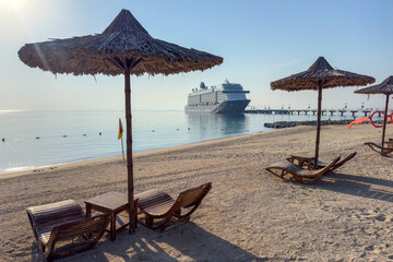Sir Bani Yas island, United Arab Emirates with cruise ship and beach with sun loungers, Sir Bani...