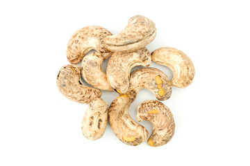 Group of roasted cashew nuts with shell isolated on white background top view flat lay stack