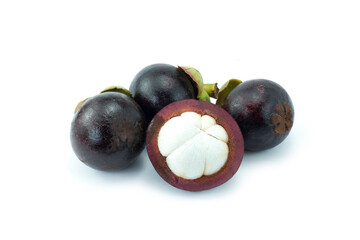 Group of fresh Mangosteen (Garcinia mangostana) or purple mangosteen fruits whole and cut half with white pulp isolated on white background close up stacking