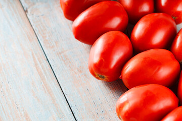 Organic Piccadilly Tomatoes on Rustic Wooden Boards for Farm-to-Table Mediterranean Dishes, Copy Space