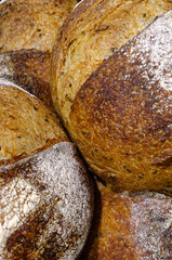 Group of traditional round loaves of dark rye bread