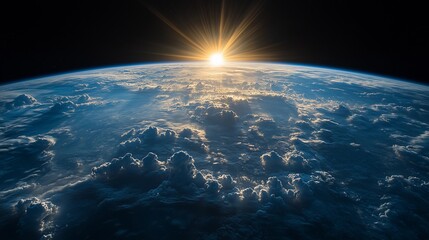 Vast view of planet Earth illuminated by a stunning sunrise over the horizon from the perspective of space