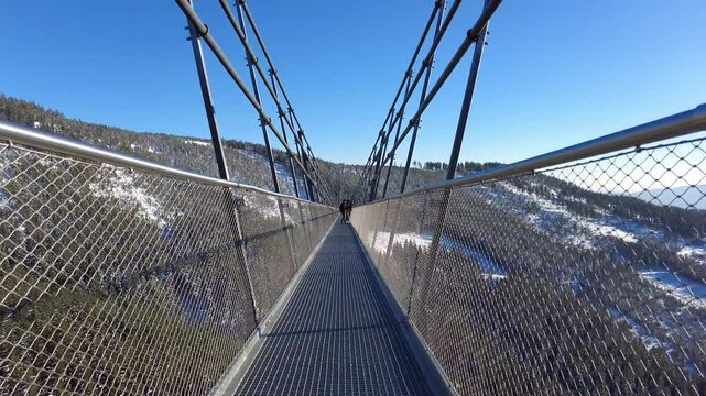 Sky Bridge 721, Lower Moravia, Czech Republic - December 1, 2024: The longest pedestrian suspension bridge in the world. Mountain resort Dolni Morava
