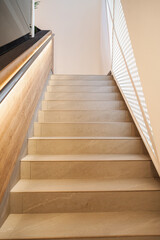 Stairs Ascending Towards Window