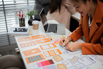 Creative Team of Graphic Designers Collaborating on Innovative Projects in a Modern Office Environment