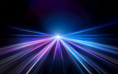 Obraz premium Abstract depiction of movement and speed, featuring bright, blurred streaks of light against a dark background.