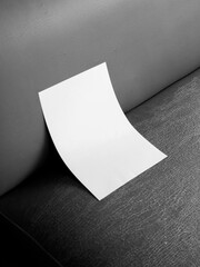 A4 poster mockup on the leather sofa background, plain flyer mockup on the sofa background