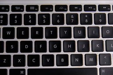 close up of laptop keyboard as a business concept
