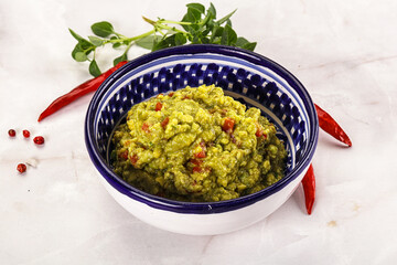 Guacamole with avocado, tomato and chili