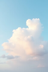 Clouds with soft pastel colors gently float across a serene blue sky on a warm sunny day outside._00001_