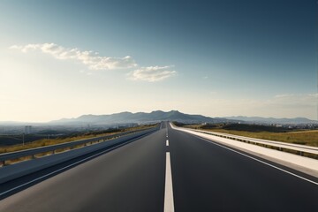 there is a long road with a white line going through it