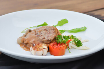 beef steak in gravy sauce or barbecued beef or grilled beef and vegetable