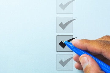 Checklist concept.,Handwritten Check Mark on Paper, Symbolizing Success, Approval, or...