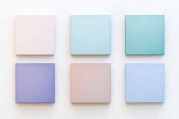 Pastel tiles in soft shades of blue, purple, and beige arranged in a grid, ideal for modern backgrounds and minimalistic designs


