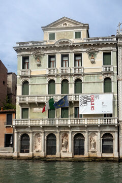 VENICE, ITALY - MAY 06, 2015:  Exterior view of Palazzo Giusti  with banner poster for Plessi exibition (Liquid Life)  at the Ca&rsquo; d&rsquo;Oro palace 