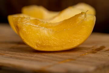 ripe soft apricot fruits on the cutting board