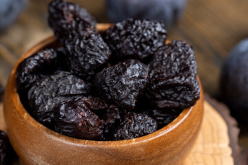 ripe purple plums and dried plums