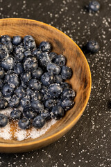 sprinkled with white sweet sugar juicy blueberry berries
