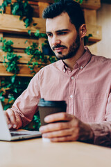 Disappointed businessman upset with project and bad news checking mail on laptop computer, frustrated male student looking sadly at monitor on netbook getting marks for project sitting in campus